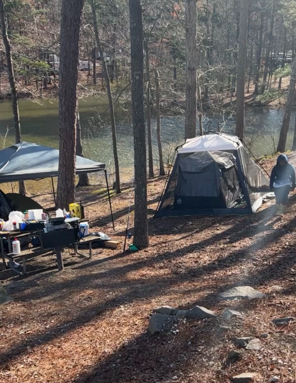 Slowing down together at our lakeside retreat — camping, fresh air, still water, real rest.